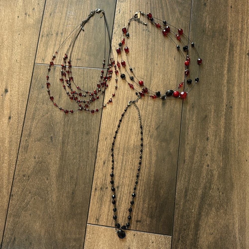black and red gently used costume jewelry